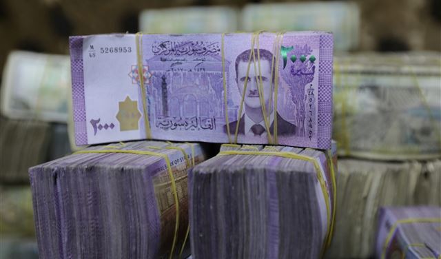 سوريا تخفض سعر صرف الليرة الرسمي مقابل الدولار
